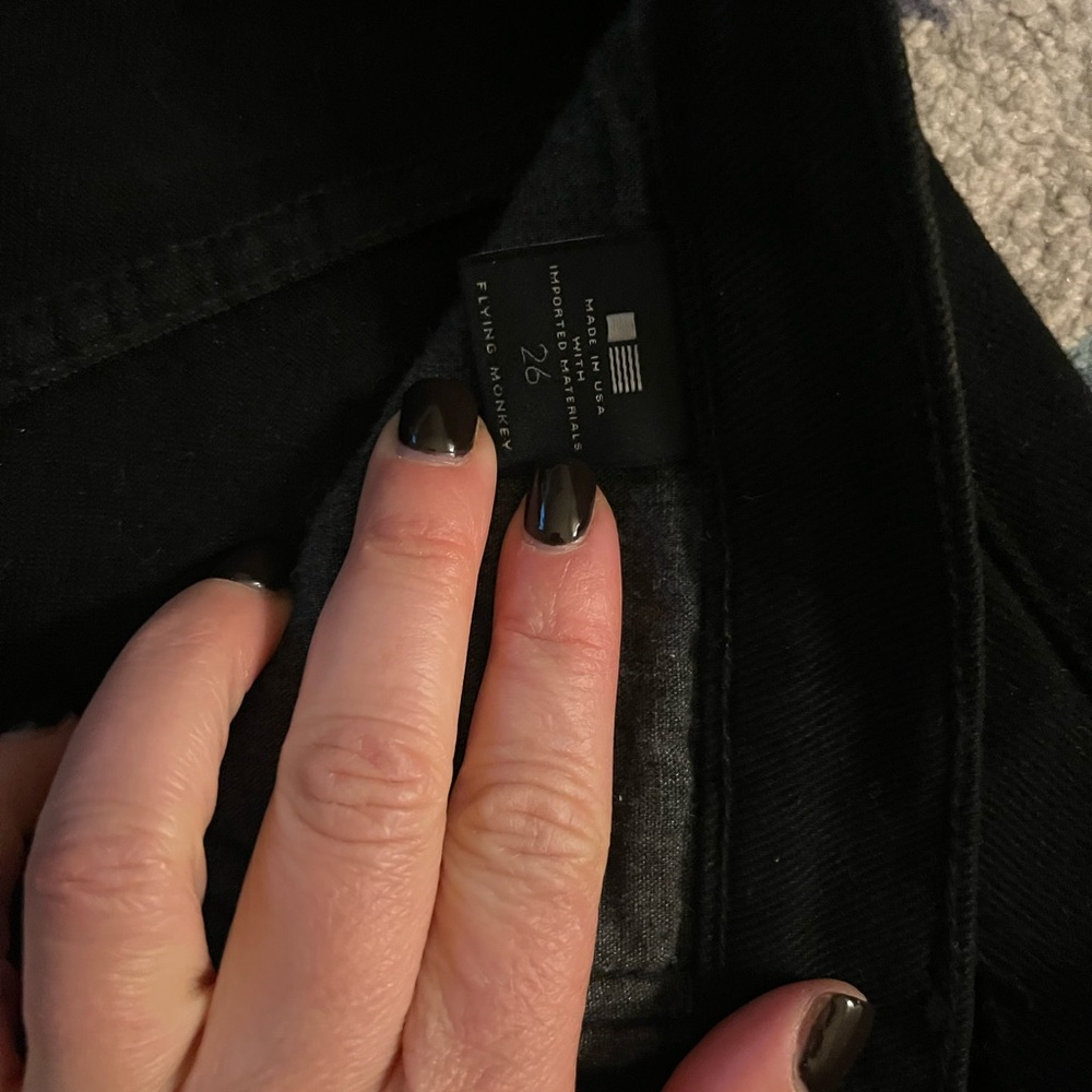 Flying Monkey black ripped jeans. Rips at the knees. Size 26. Boutique jeans.